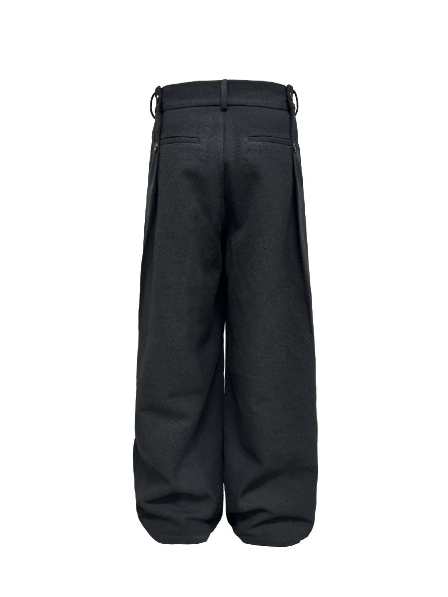 Pantalon ample en laine à plis ajustables et boutons